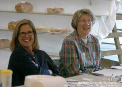 Two Women Volunteers Smiling