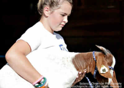 Girl Showing Goat